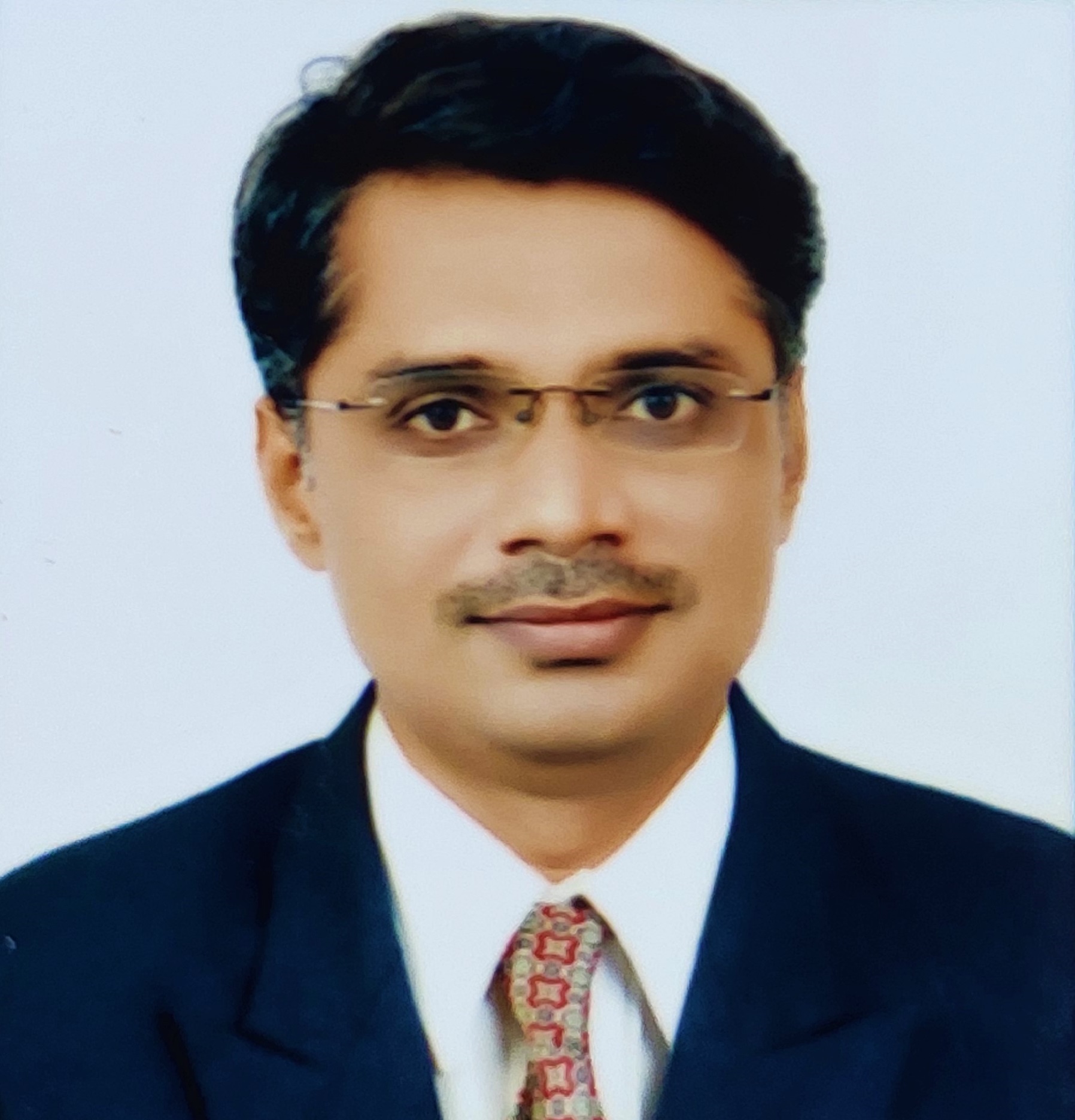 Dr. [Ms.] Dr. Mallikarjun Dhotre